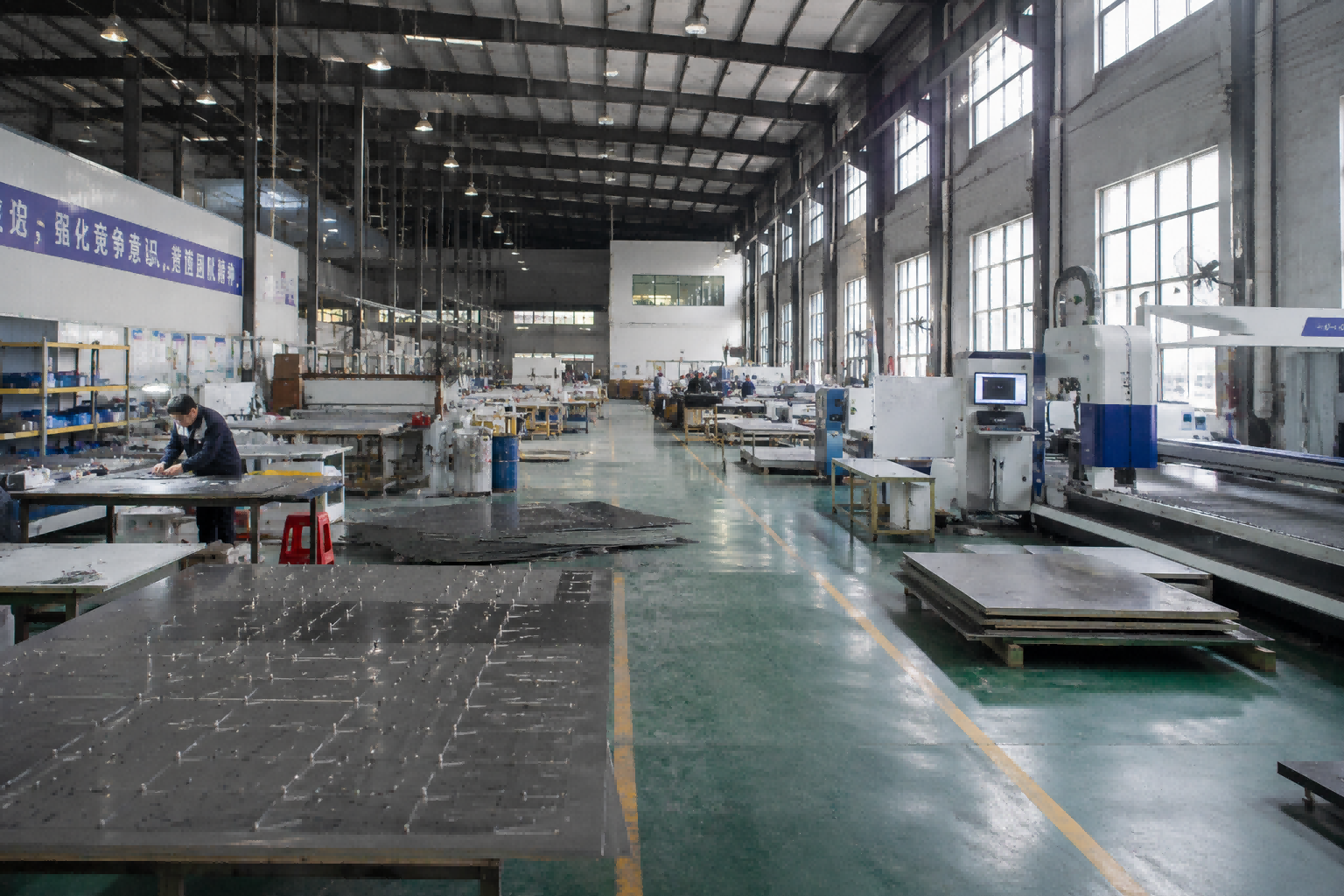 Custom signage manufacturing workshop with advanced production equipment